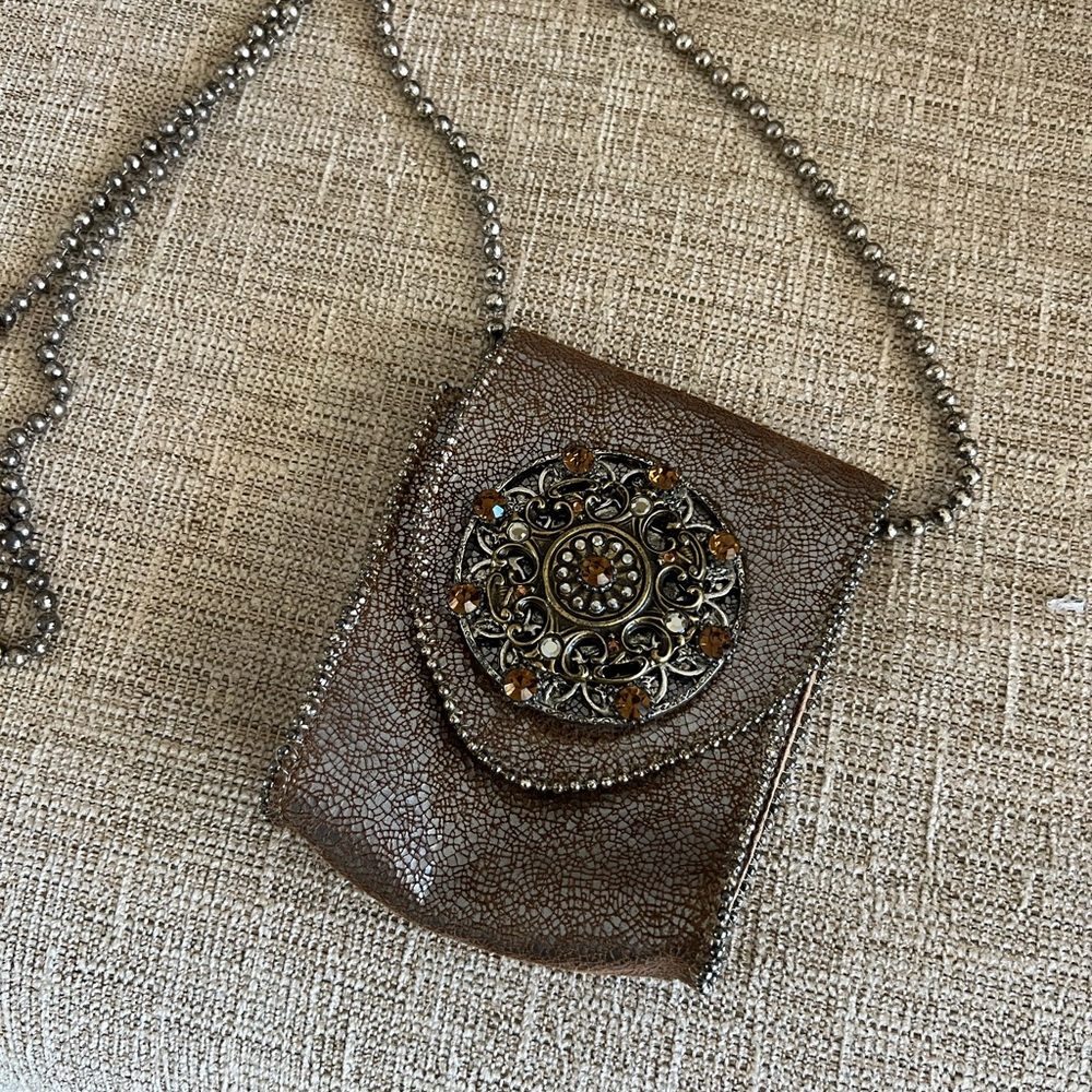 5 3/4" X 5" X2" cross body real distressed leather bag .gorgeous stones